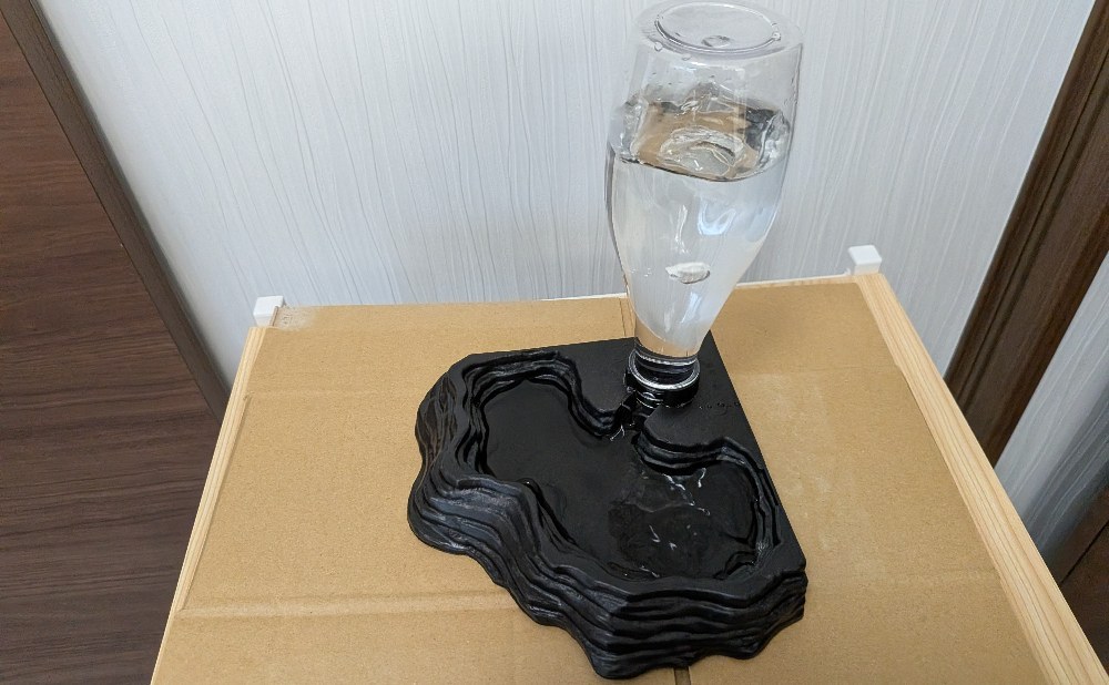 トプトプと水皿に給水されていき…